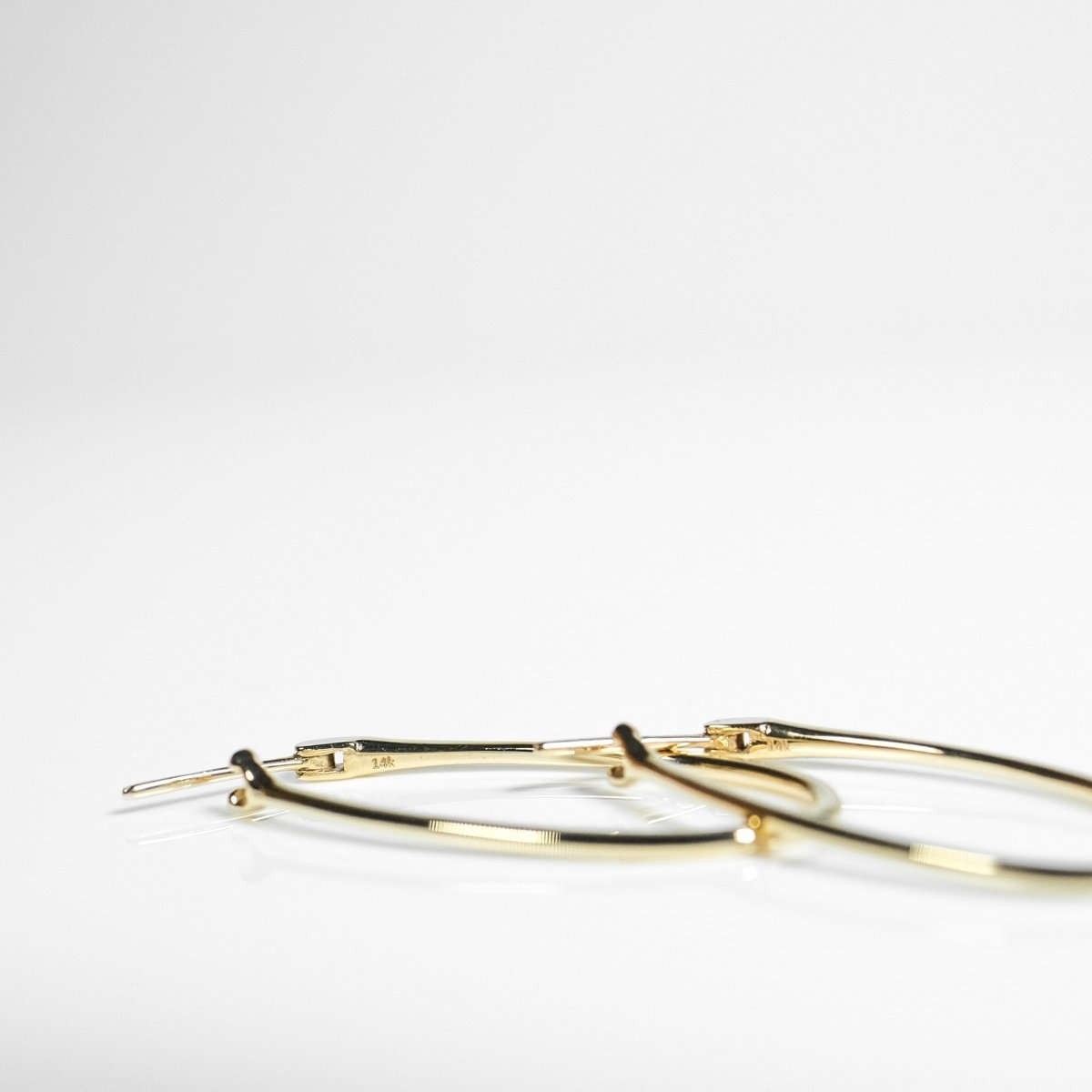 14k Solid Gold Eellipse Hoops - aucentic